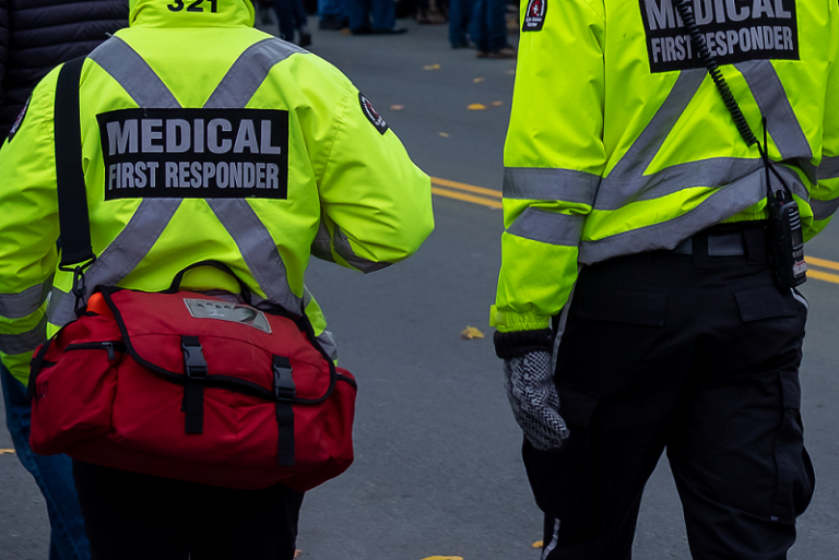 Two medical first responders walking